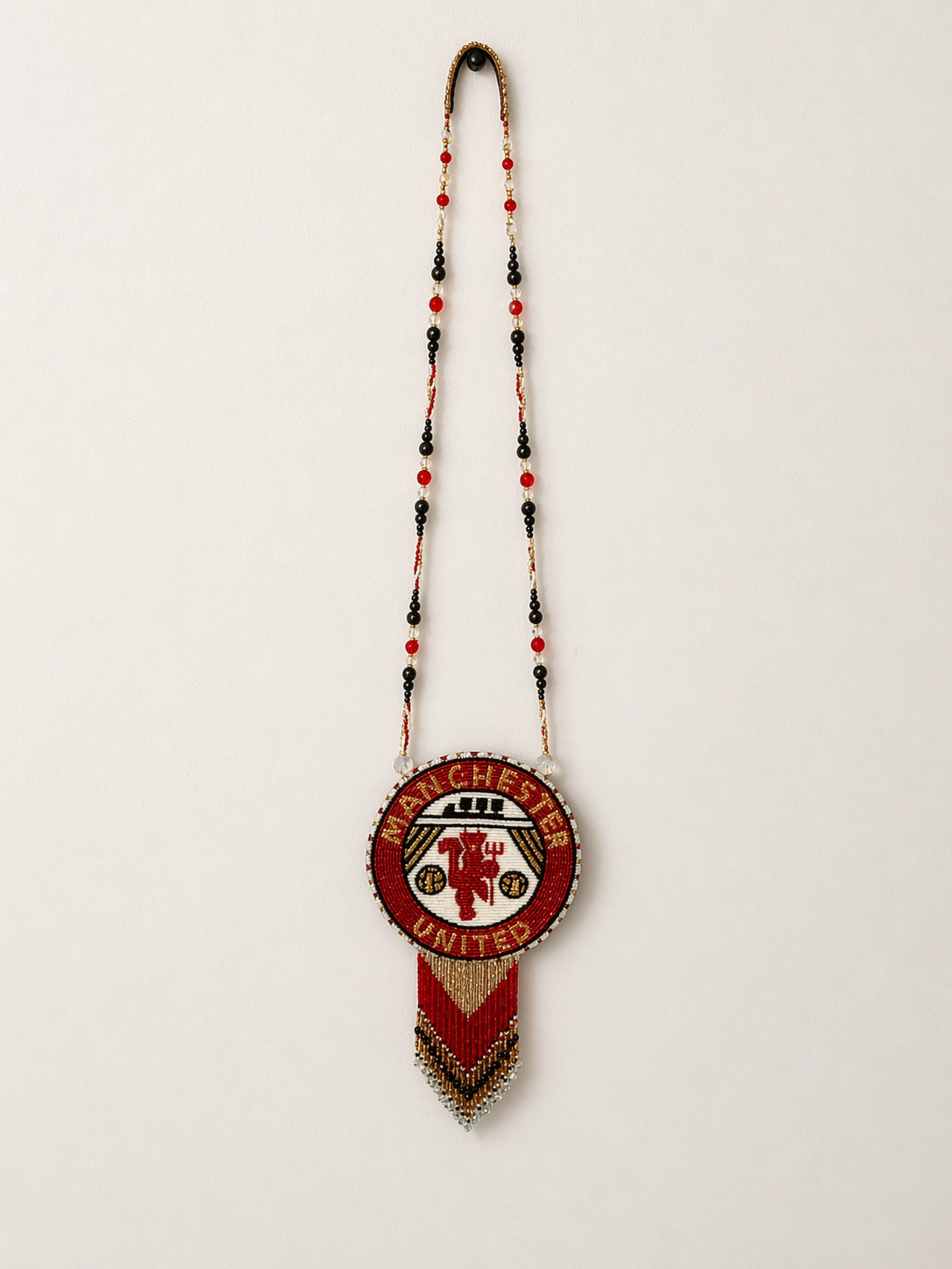 Manchester United beaded medallion
